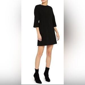 Alice +Olivia 100 % Wool Sweater Size Medium Dress BlackBell Ribbed Cuffs/Hem